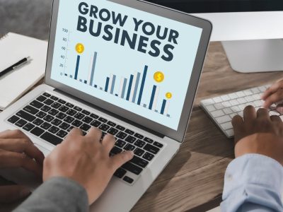 Grow Business on laptop screen.