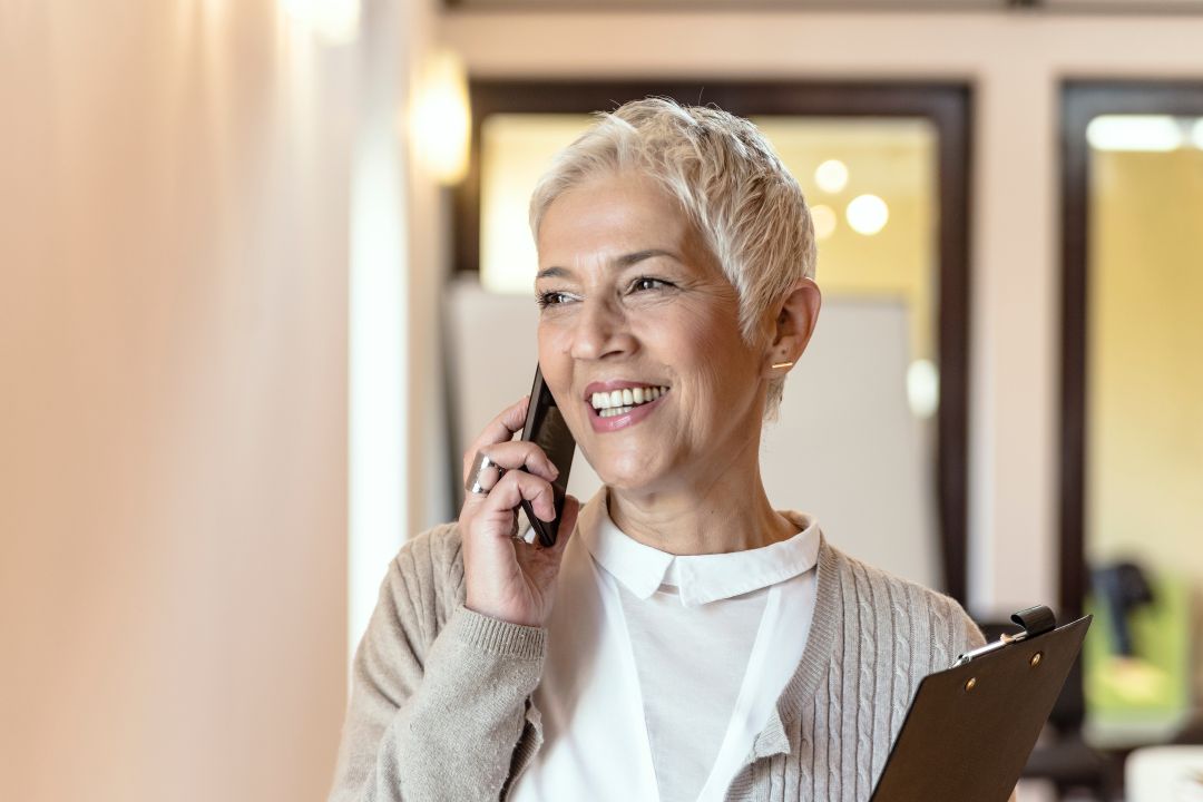 Lady on phone using Phone Etiquette